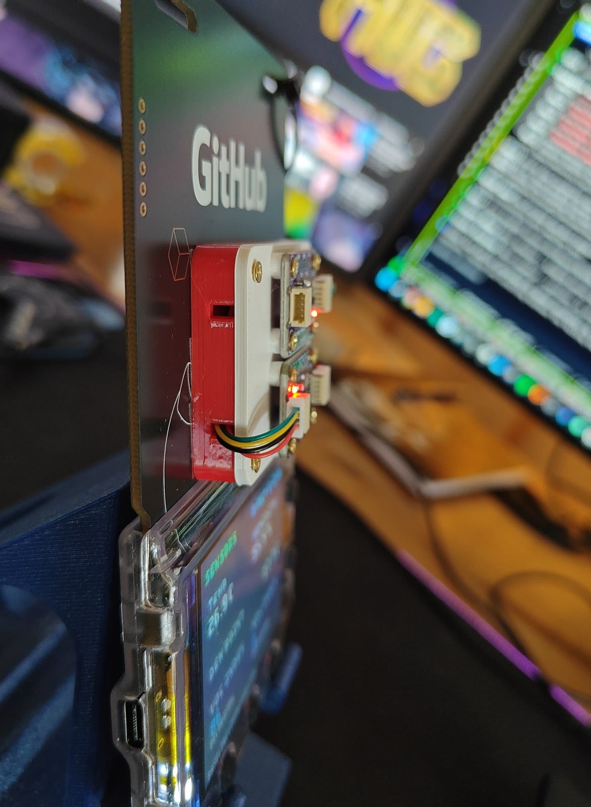 Opposite-side view of the completed mount showing short cable loops and clear access to the badge screen